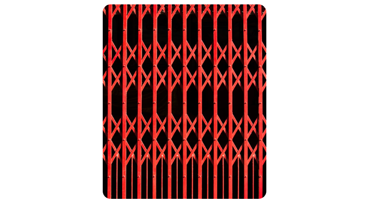 Red collapsible metal security shutter